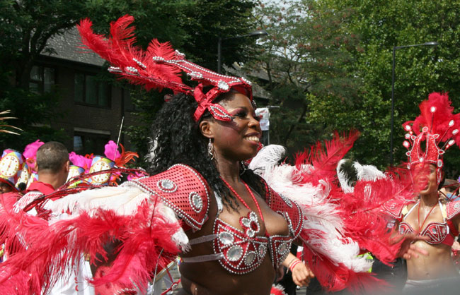 Bright colours, dance, music and joy during the Notting Hill Carnival. Photographer Maggie Foyer